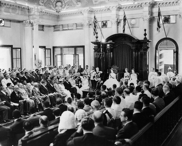 22 Apr 1958, Port-of-Spain, Trinidad, Trinidad and Tobago --- 4/22/1958-Port of Spain, Trinidad-General view of the chamber during the Inauguration of the Federal Legislature of the West Indies.  The ceremony, officiated by Princess Margaret, brought into formal being the newest member of the British Commonwealth, the West Indies Federation.  Seated to the left of the Princess in this photo is Lord Hailes, Governor General of the Federation. --- Image by © Bettmann/CORBIS